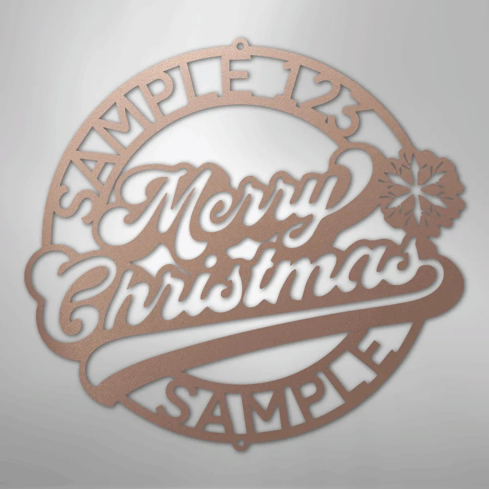Copper metal Christmas ring wall art with "Merry Christmas" and snowflake design.