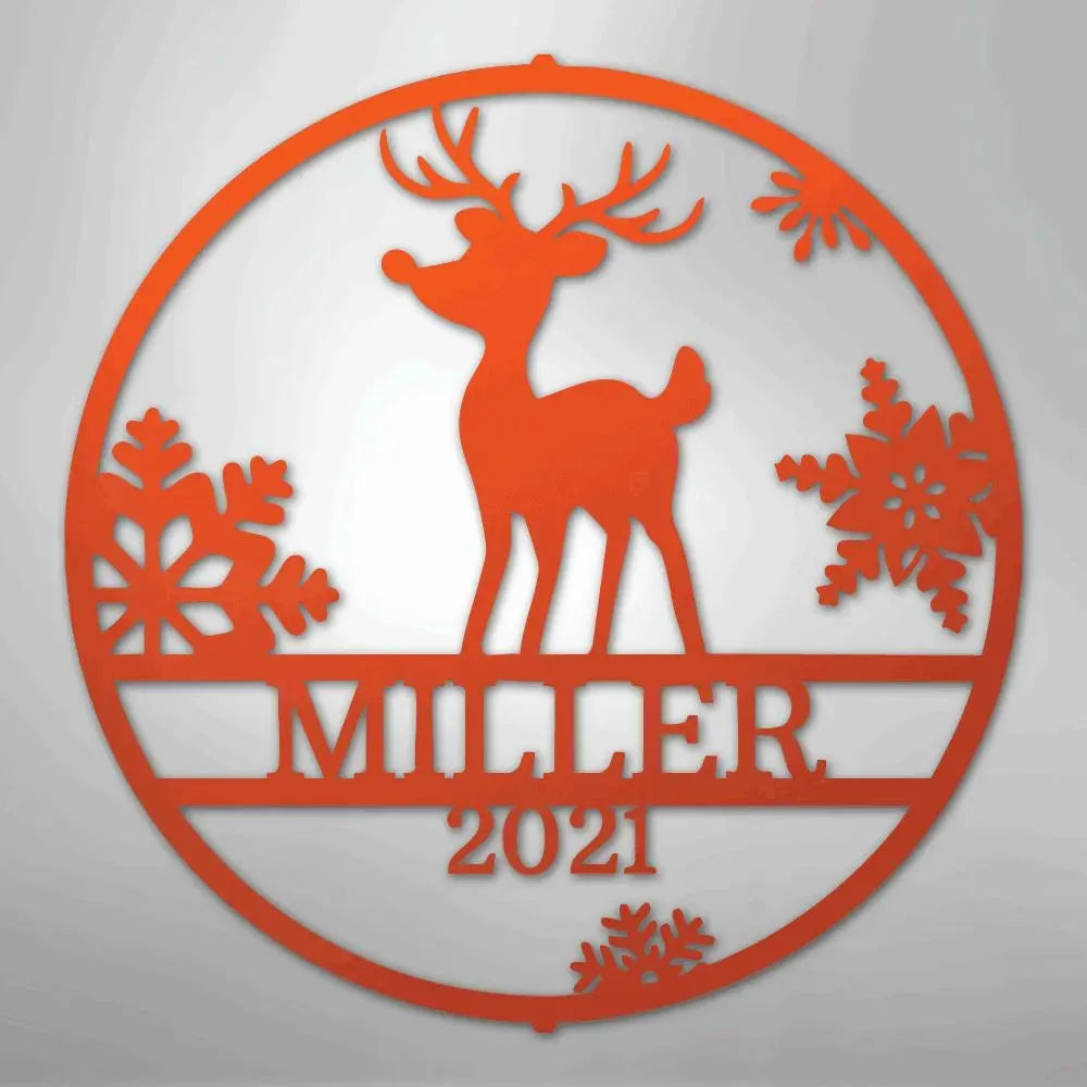 Orange metal wall art with a reindeer, snowflakes, and "MILLER 2021" text in a circular design.