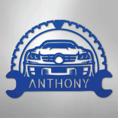 Blue metal classic car monogram wall art with a gear and wrench design, personalized with "ANTHONY".