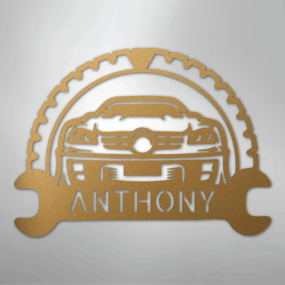 Gold metal classic car monogram wall art with a wrench and gear design, personalized with "ANTHONY".