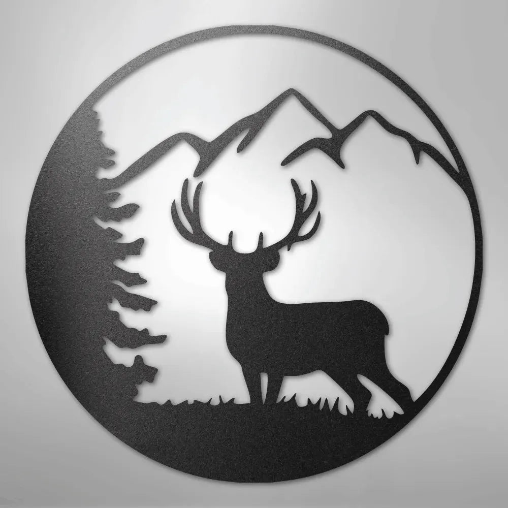 Black metal wall art featuring a graceful deer, pine tree, and mountains within a circular design.
