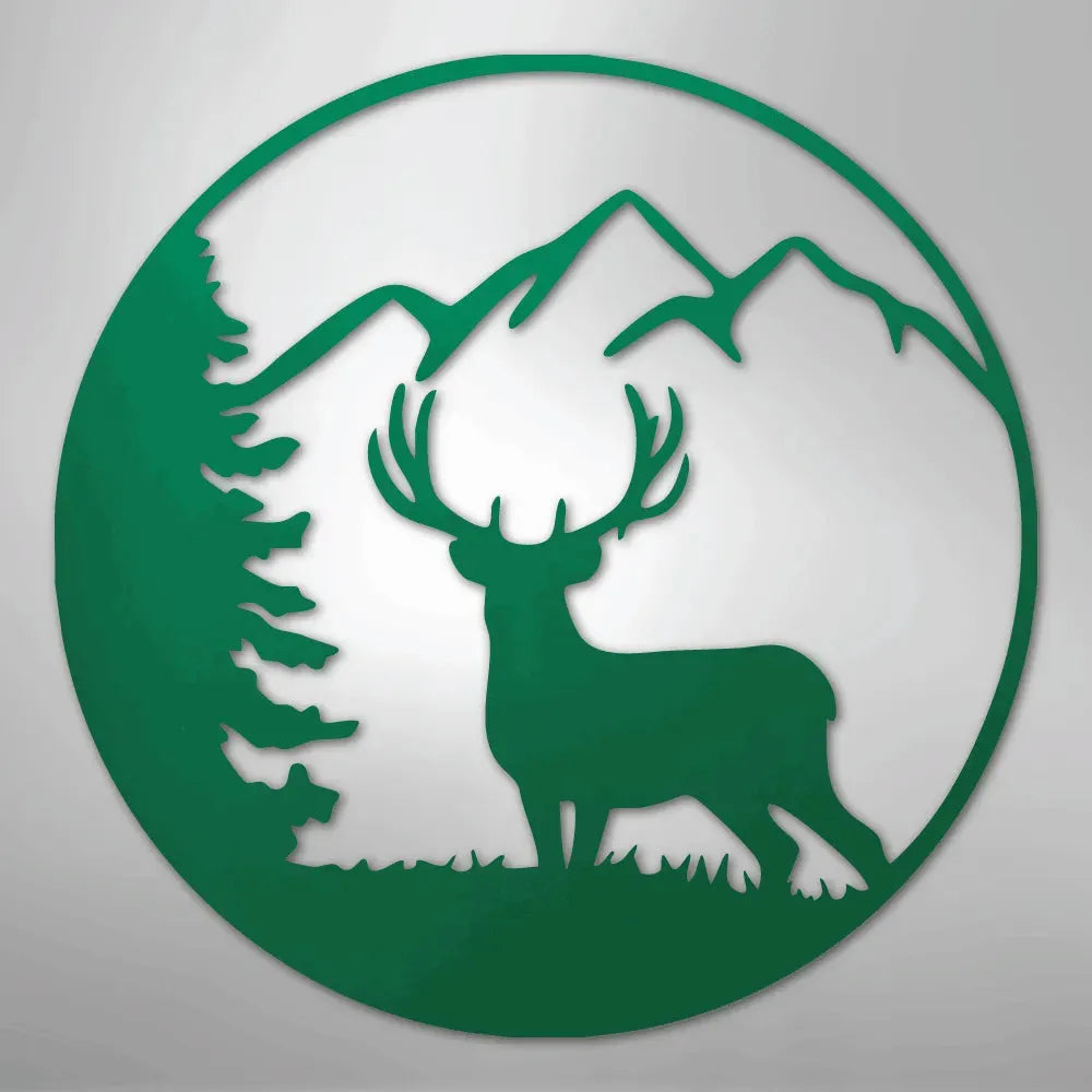 Green metal wall art featuring a graceful deer, pine tree, and mountains within a circular frame.