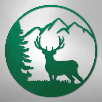 Green metal wall art featuring a graceful deer, pine tree, and mountains within a circular frame.