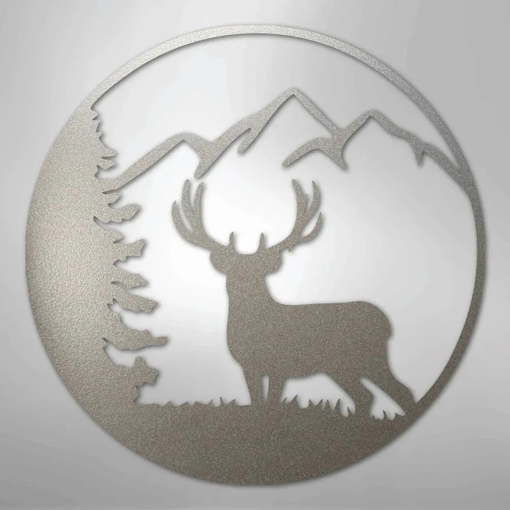 Silver metal wall art: circular deer silhouette with mountains and pine tree.