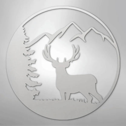 White metal wall art featuring a graceful deer, pine tree, and mountains in a circular design.