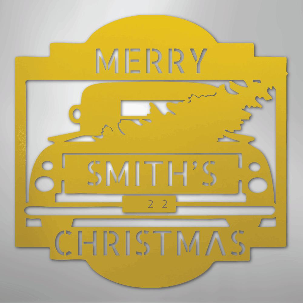 Gold metal Christmas truck monogram with "Merry Smith's 22 Christmas" cut-out design.