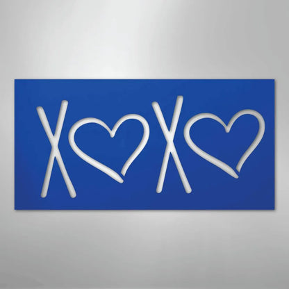 Blue metal XOXO wall art with white cutout letters and heart shapes.