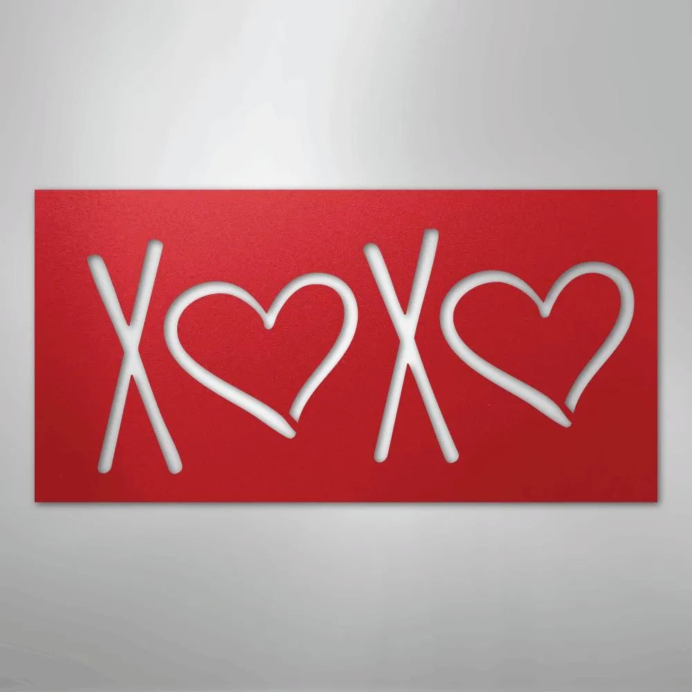Red metal XOXO wall art with two heart cutouts, powder-coated American steel decor.