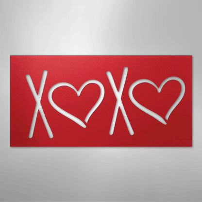 Red metal XOXO wall art with two heart cutouts, powder-coated American steel decor.