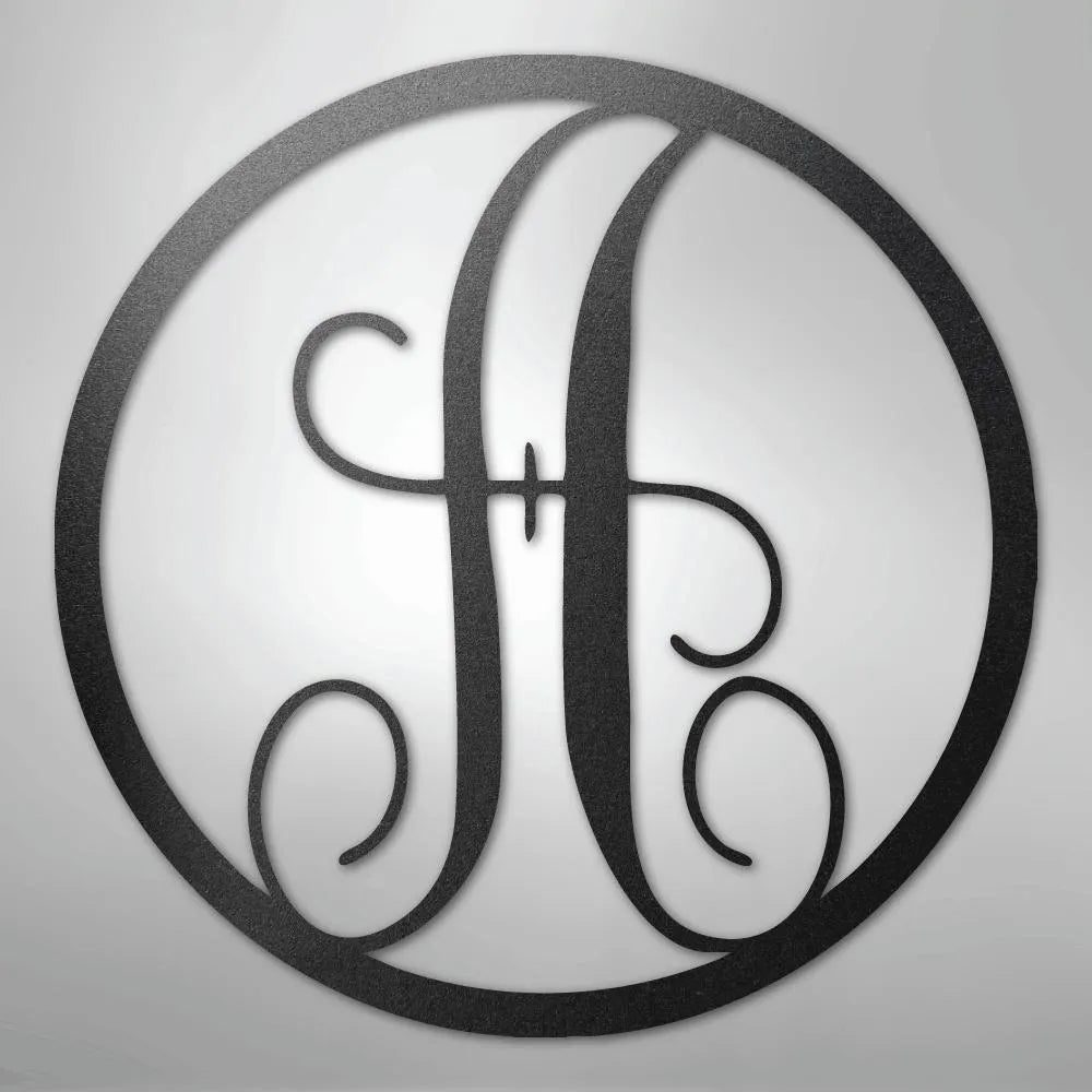 Black metal wall art with a fancy script letter "H" inside a circular frame.