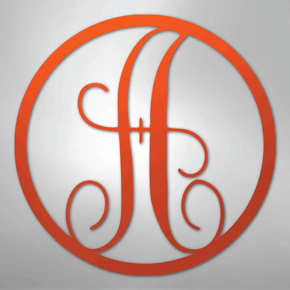 Orange metal wall art: a fancy script initial "A" inside a circular frame.