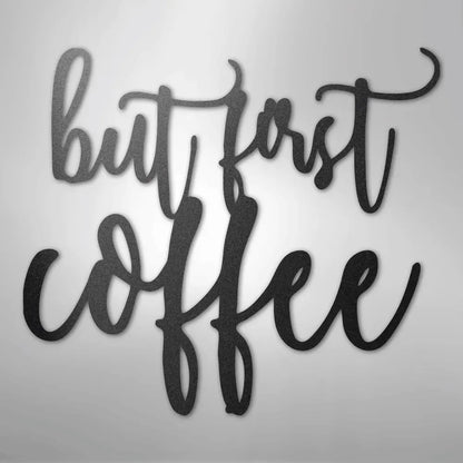 Black metal wall art decor with "but first coffee" in elegant script.