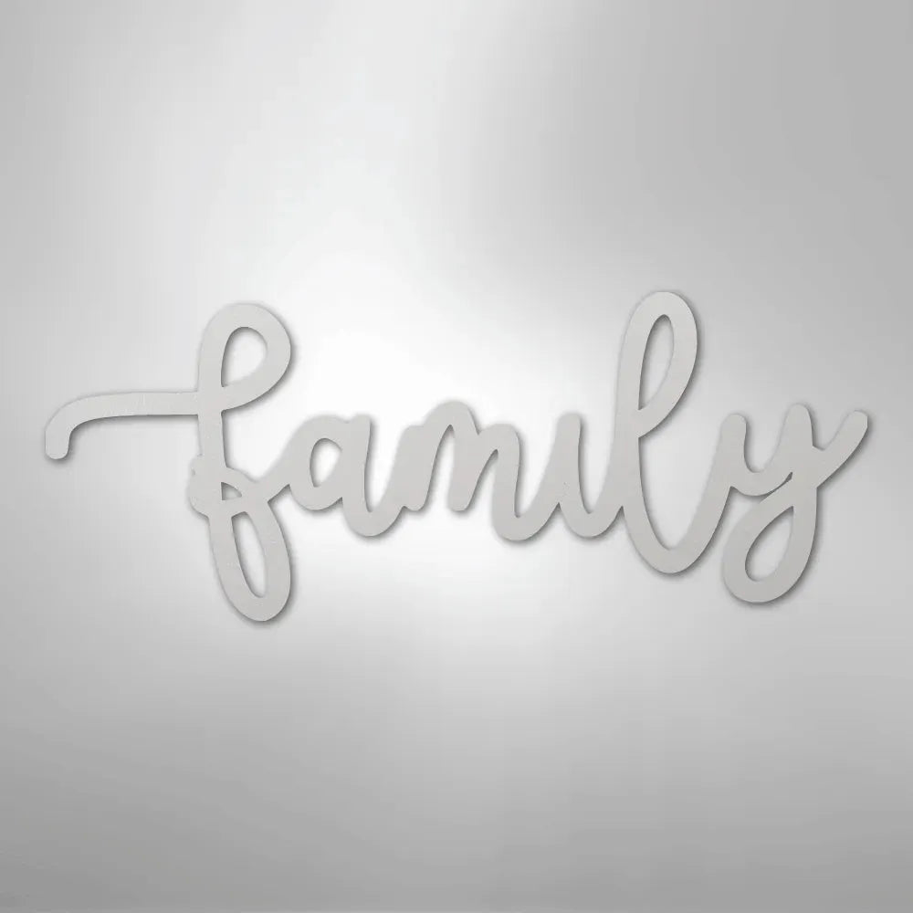 White metal "family" script wall art in a flowing cursive font.