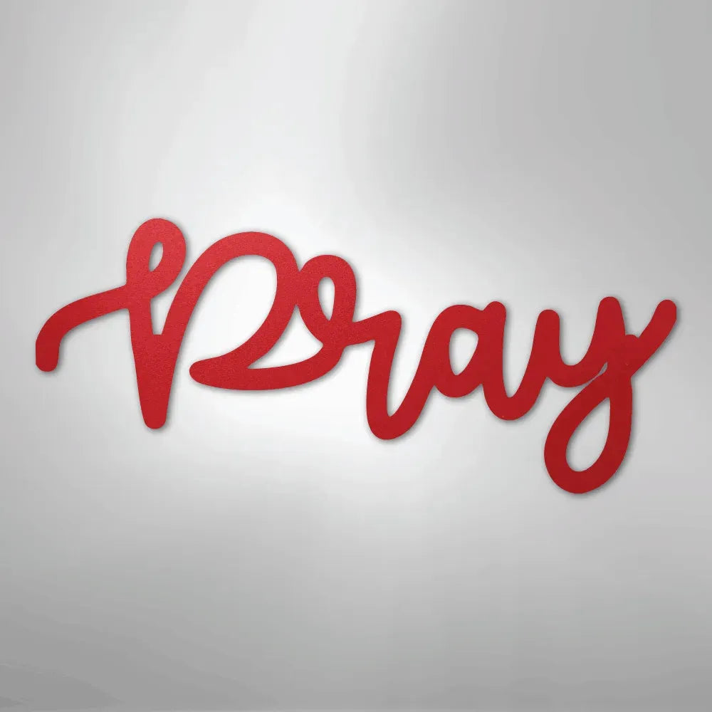 Red metal wall art spelling "Pray" in elegant script, with a textured finish.