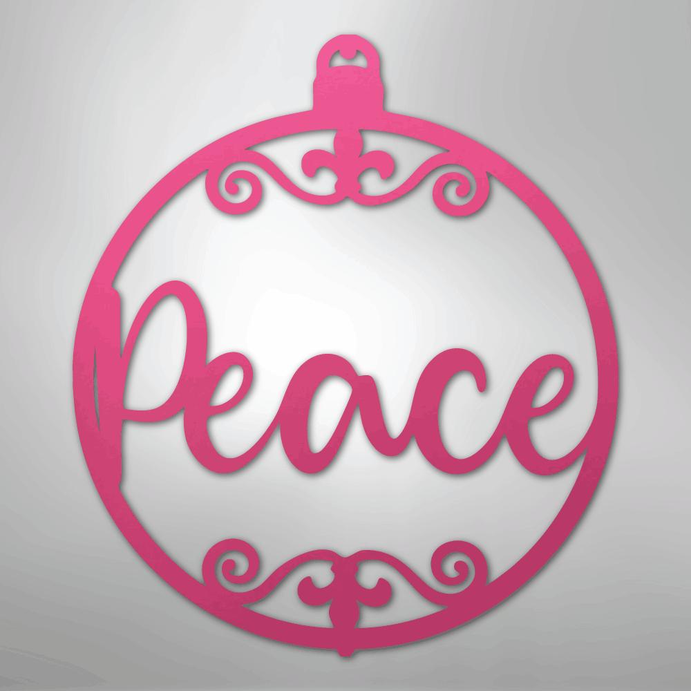 Pink metal Christmas ornament wall art with "Peace" in script and decorative swirls.