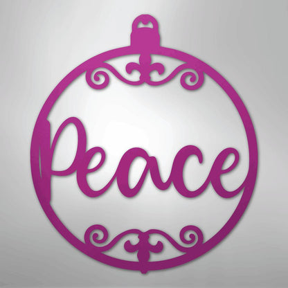 Pink metal Christmas ornament wall art with "Peace" in script and decorative flourishes.