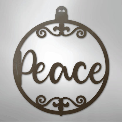 Dark brown metal wall art shaped like a Christmas ornament with "Peace" in script and decorative flourishes.