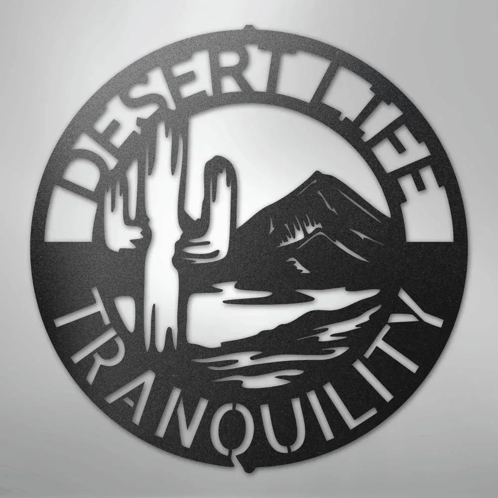 Black metal "Desert Life Tranquility" wall art with saguaro cactus and mountain design.
