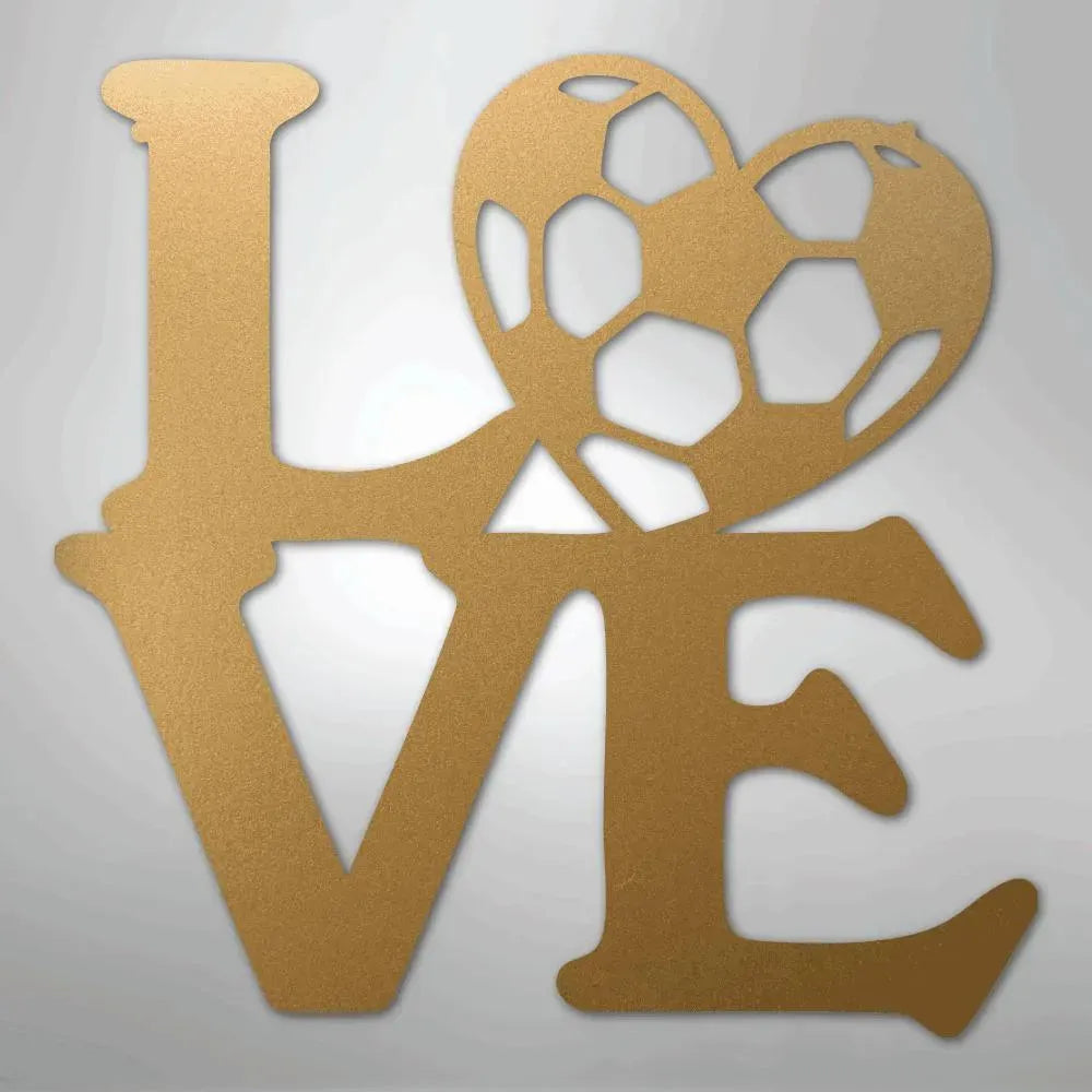 Gold metal "LOVE" wall art with a soccer ball heart.