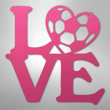 Pink metal "LOVE" wall art with a soccer ball heart.