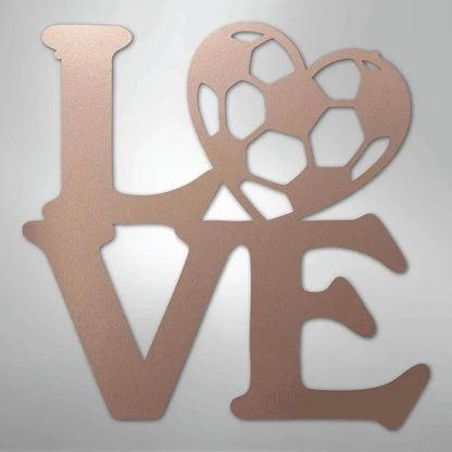Rose gold metal "LOVE" wall art with a soccer ball heart.