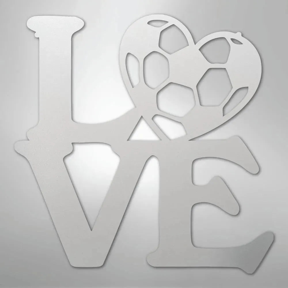 White metal "LOVE" wall art with a soccer ball heart, crafted from American steel.