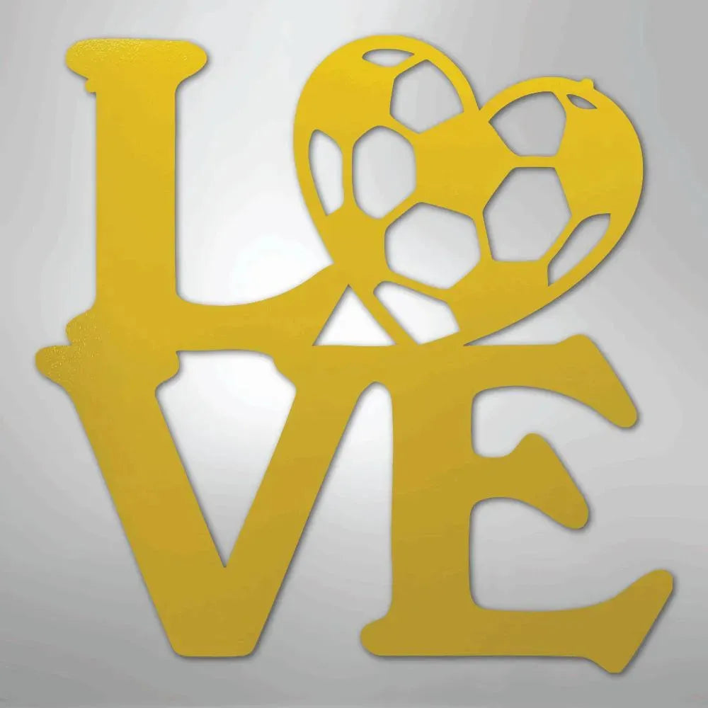 Gold metal "LOVE" wall art with a soccer ball heart.