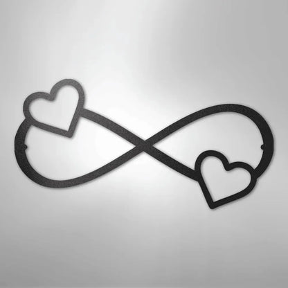 Black metal infinity symbol wall art with two hearts, one on each loop.