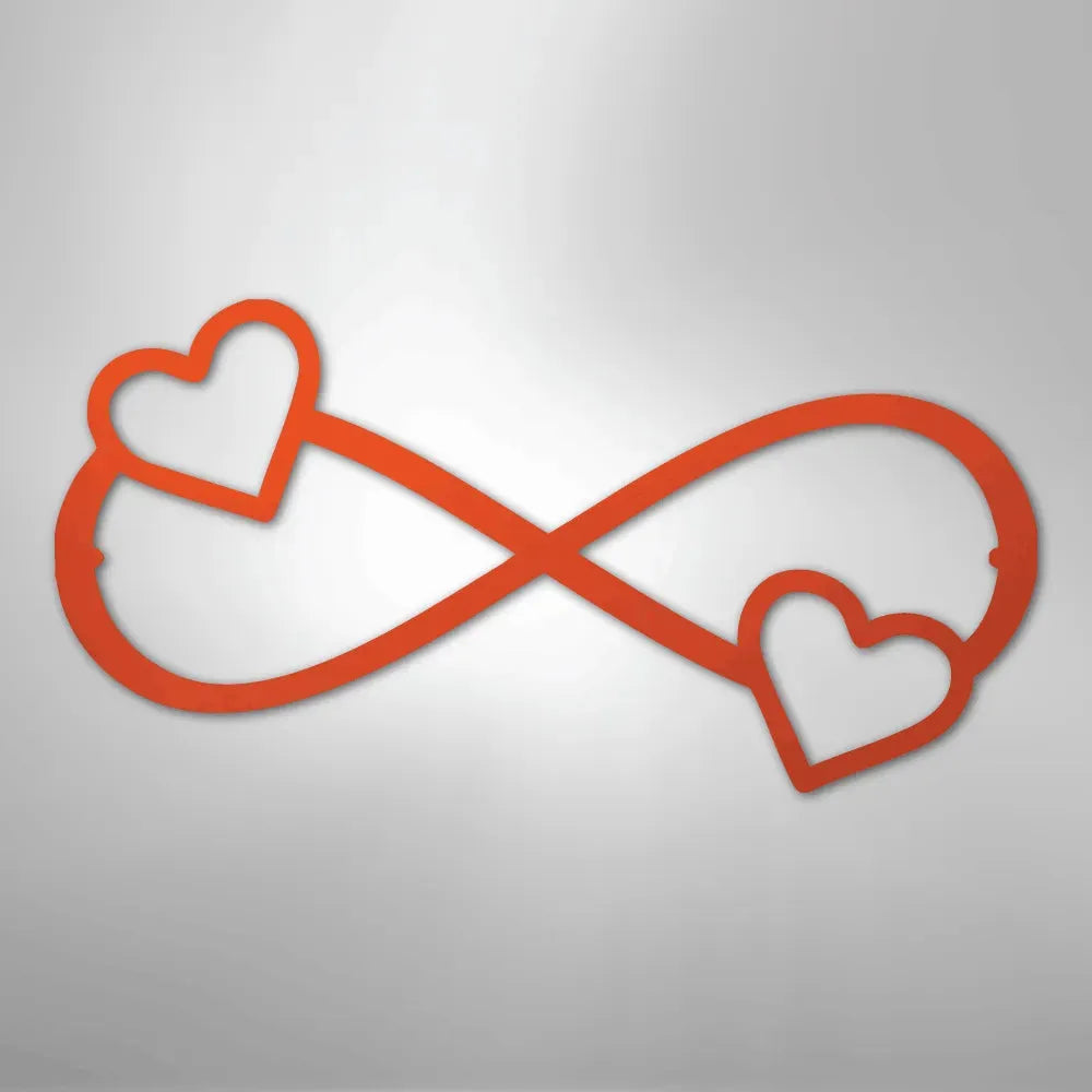 Red metal infinity symbol wall art with two hearts, one on each loop.