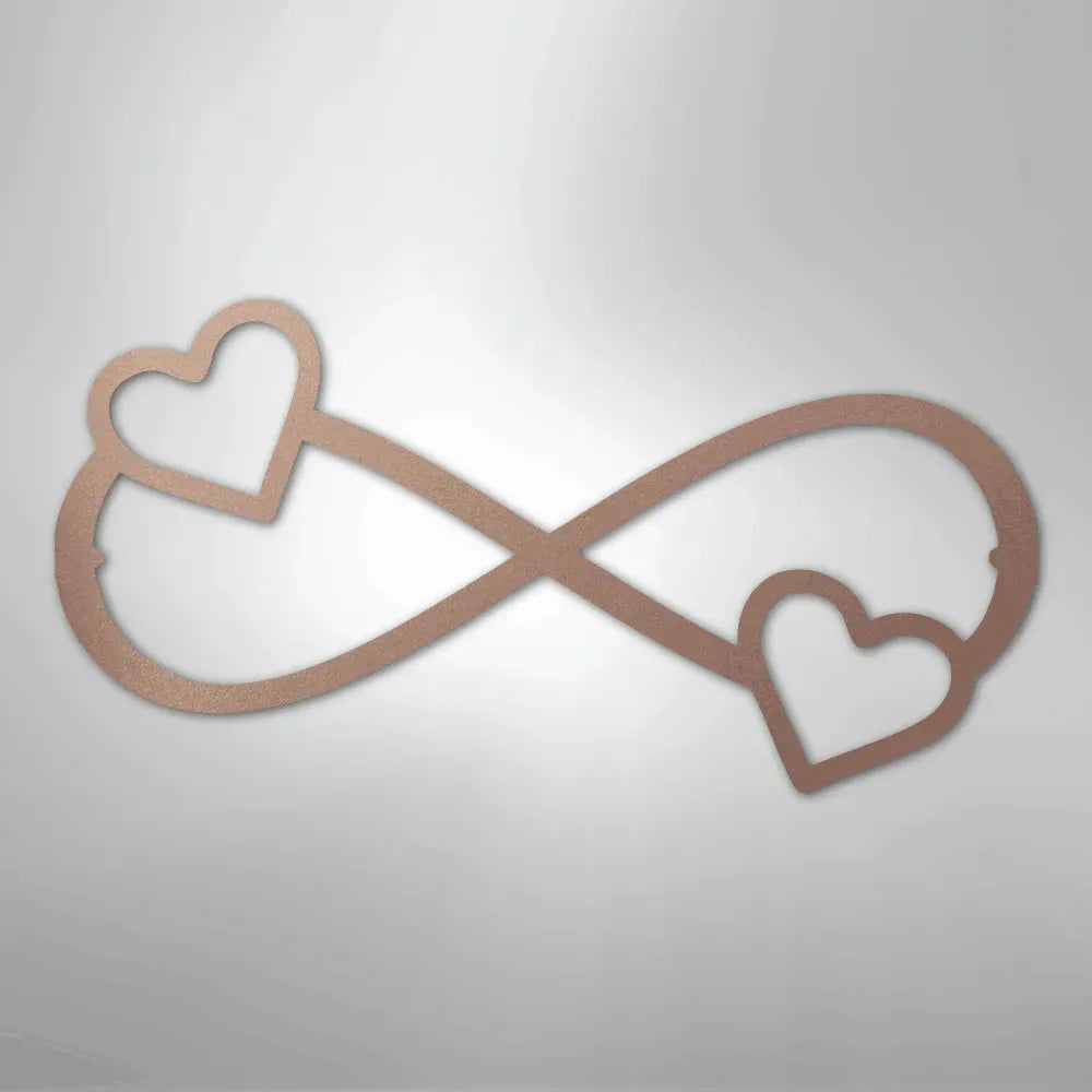Rose gold metal infinity symbol with two hearts, one on each loop.