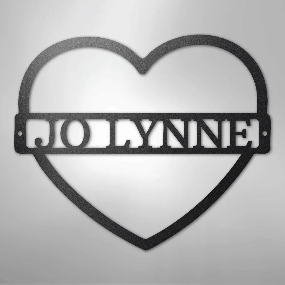 Black metal heart wall art with "JOLYNNE" custom monogram.
