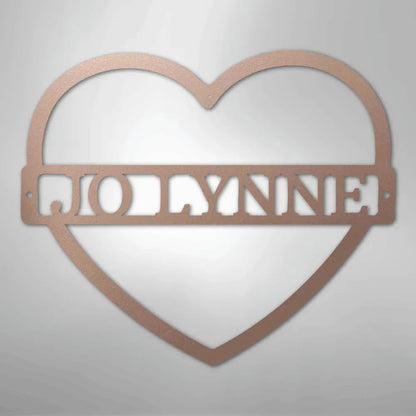 Copper heart-shaped metal wall art with "JOLLYNNE" cut out in the center.