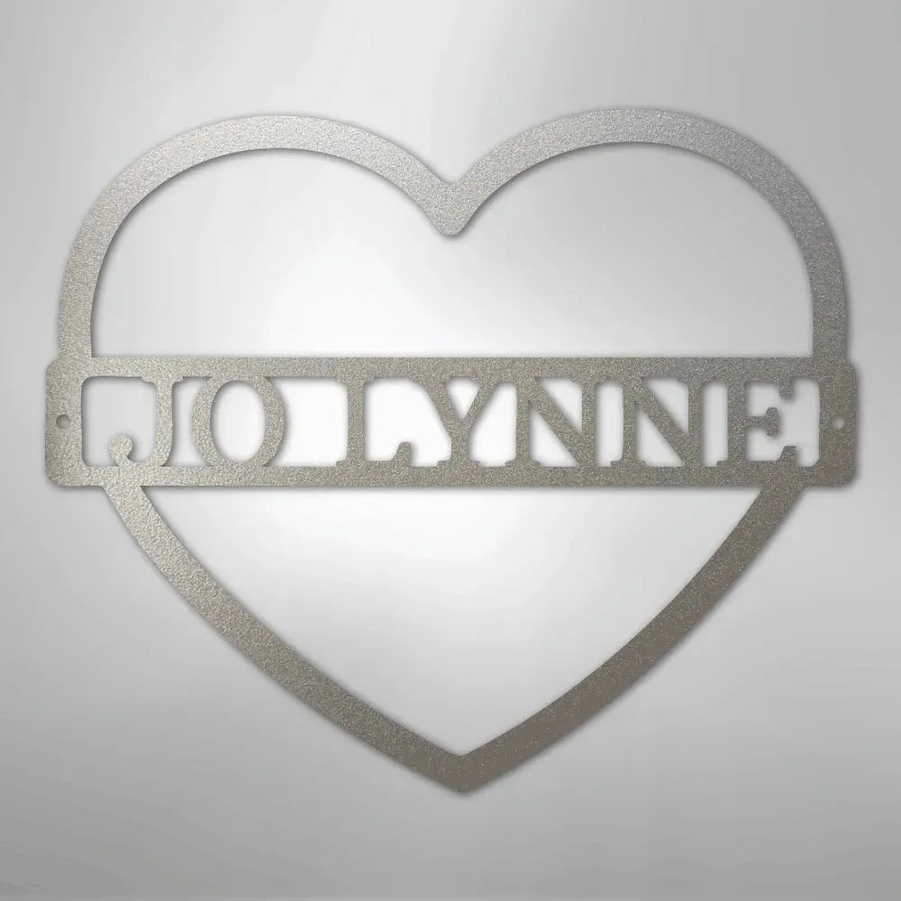 Silver metal heart wall art with "MOLLYNN" custom monogram.