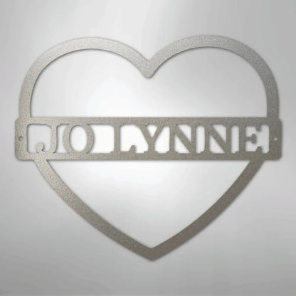 Silver metal heart wall art with "MOLLYNN" custom monogram.