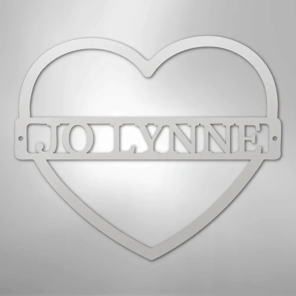 White metal heart wall art with "JOLLYNNE" custom name monogram.