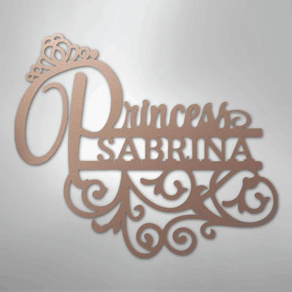 Rose gold metal wall art with "Princess Sabrina" in script and block fonts, featuring a crown and ornate scrollwork.
