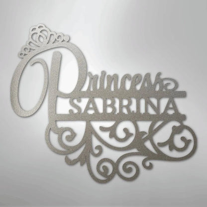 Silver metal "Princess Sabrina" wall art with a crown and decorative scrollwork.