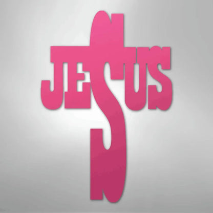 Pink metal wall art shaped like a cross with "JESUS" integrated into the design.