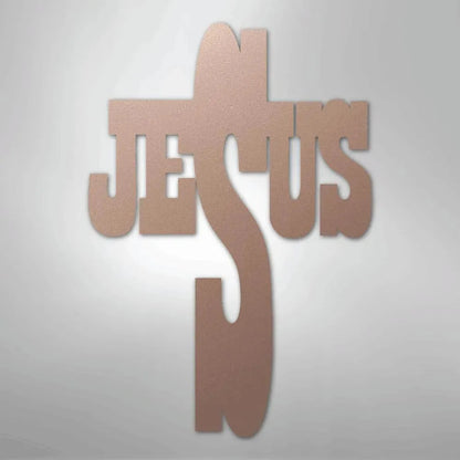 Rose gold metal wall art forming a cross with the word "JESUS" integrated into its design.