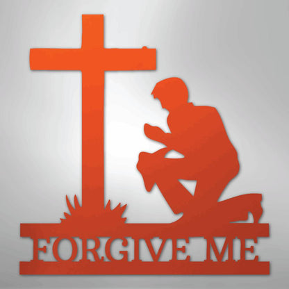 Orange metal wall art depicting a kneeling man praying before a cross, with "FORGIVE ME" cut out below.