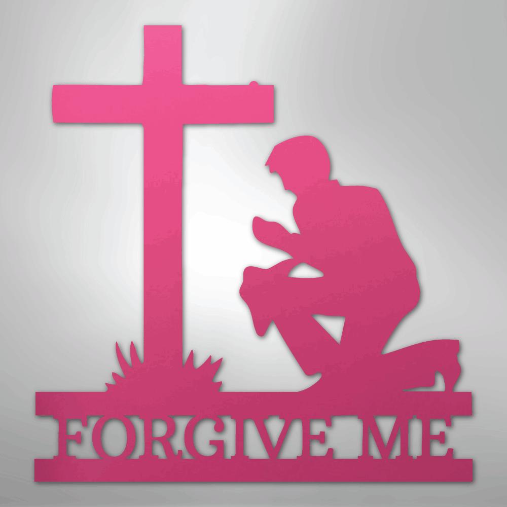 Pink metal wall art of a man kneeling before a cross with "FORGIVE ME" cut out below.
