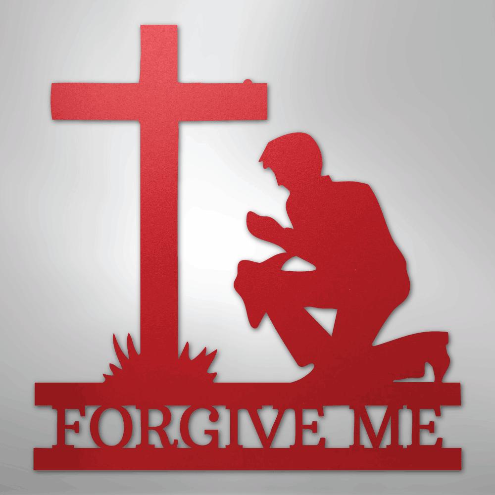 Red metal wall art depicting a kneeling man praying before a cross, with "FORGIVE ME" cut out below.
