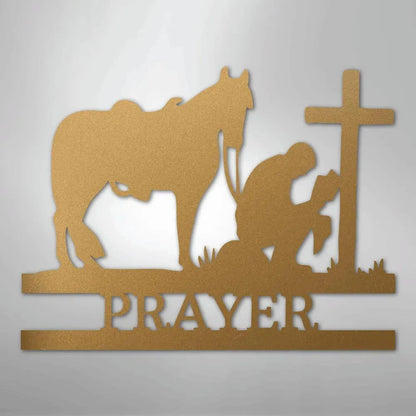 Gold metal wall art: kneeling cowboy praying by a cross with a horse, "PRAYER" below.
