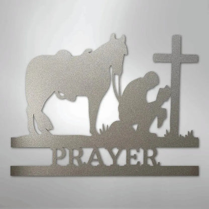Silver metal wall art: cowboy kneeling by a cross and horse, with "PRAYER" text below.