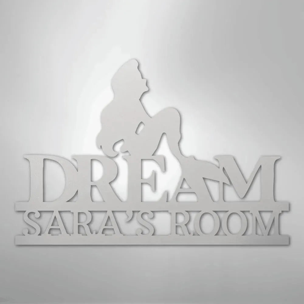 White metal wall art featuring a mermaid silhouette above "DREAM SARA'S ROOM" text.