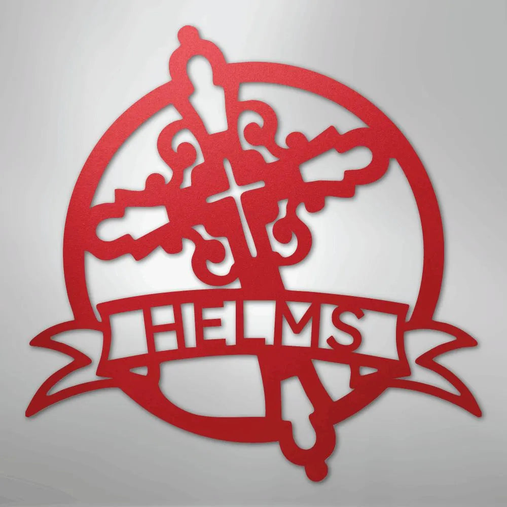 Red metal Catholic monogram wall art with a cross, ornate details, and "HELMS" on a banner.