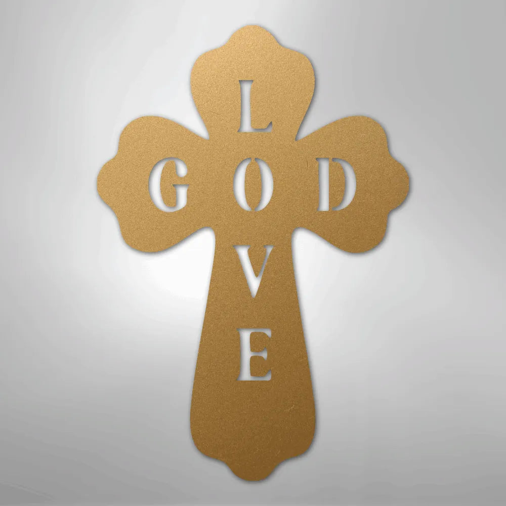 Gold metal cross wall art with "GOD" horizontally and "LOVE" vertically cut out.