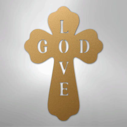 Gold metal cross wall art with "GOD" horizontally and "LOVE" vertically cut out.
