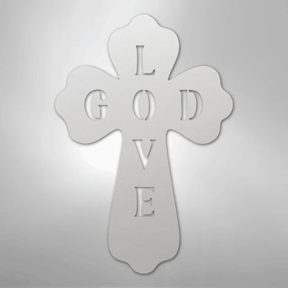 White metal wall art cross with "GOD LOVE" cut out, featuring decorative scalloped edges.