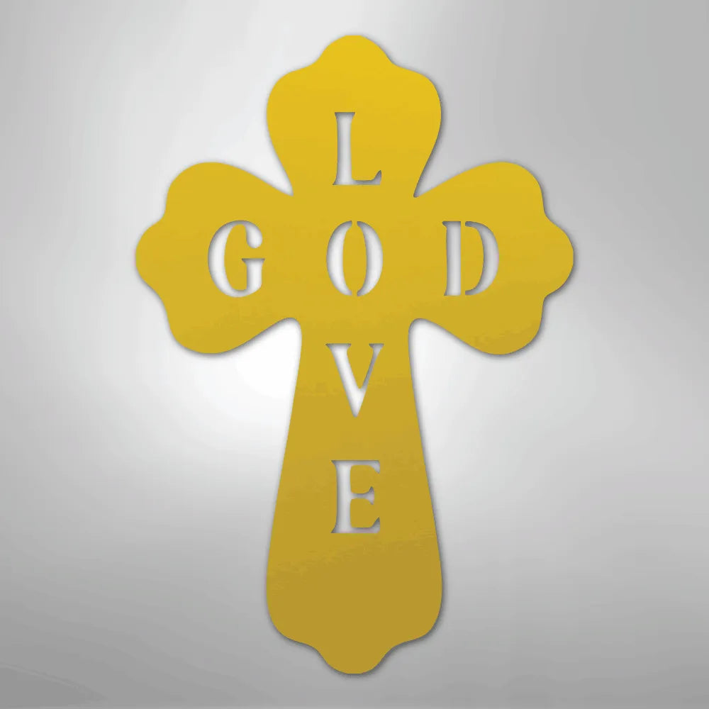 Gold metal cross wall art with "GOD" vertically and "LOVE" horizontally cut out.